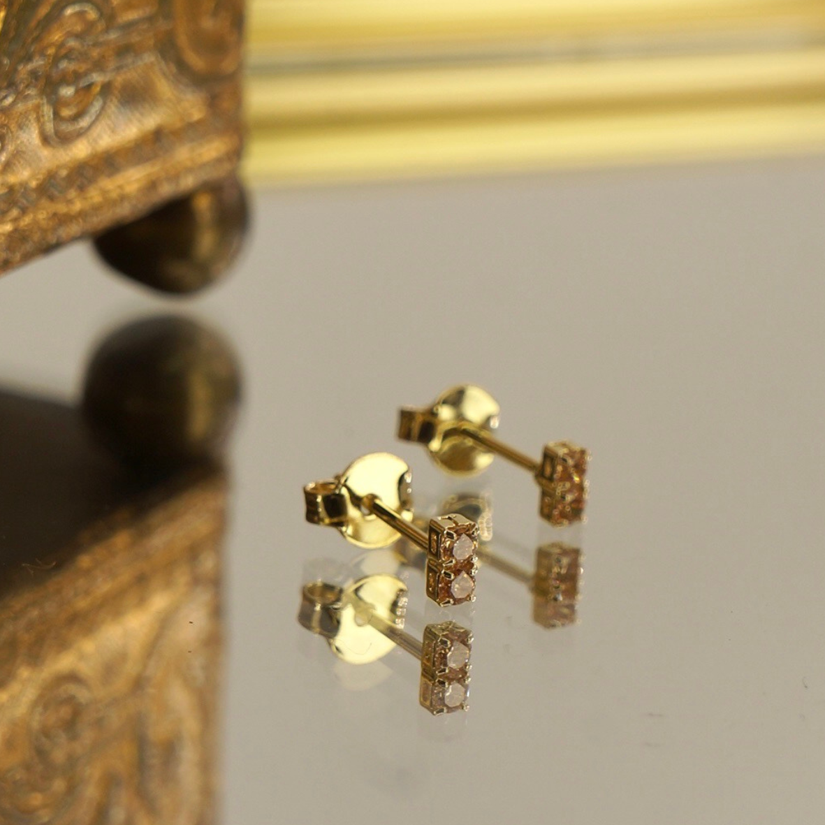 Aros enchape oro 18k mini 2 circones miel