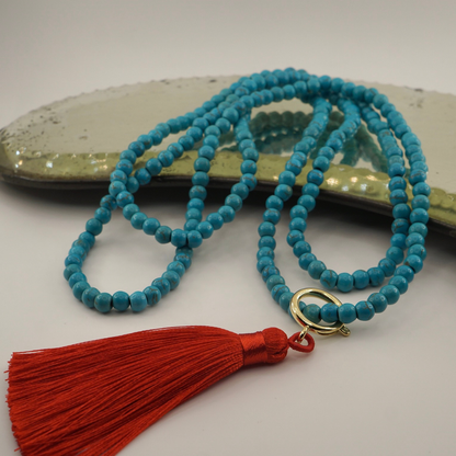 Collar piedra turquesa borla roja
