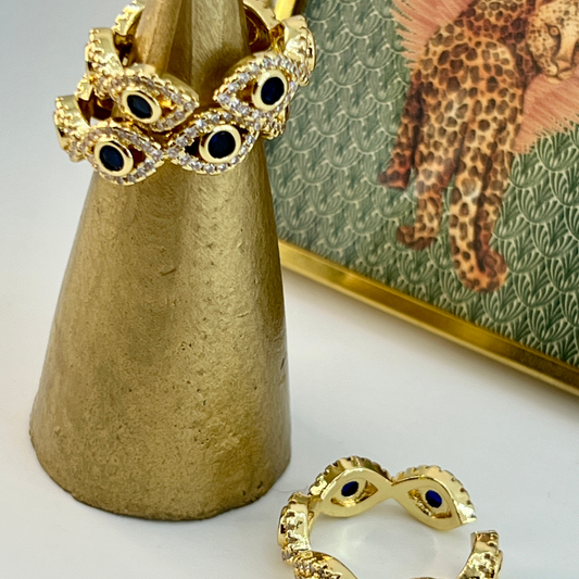 Anillo ojo turco enchape oro circón azul